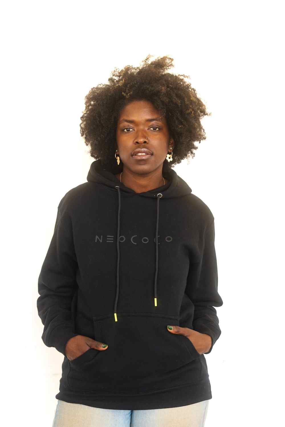 smiling model wearing fleece-lined cotton sweatshirt