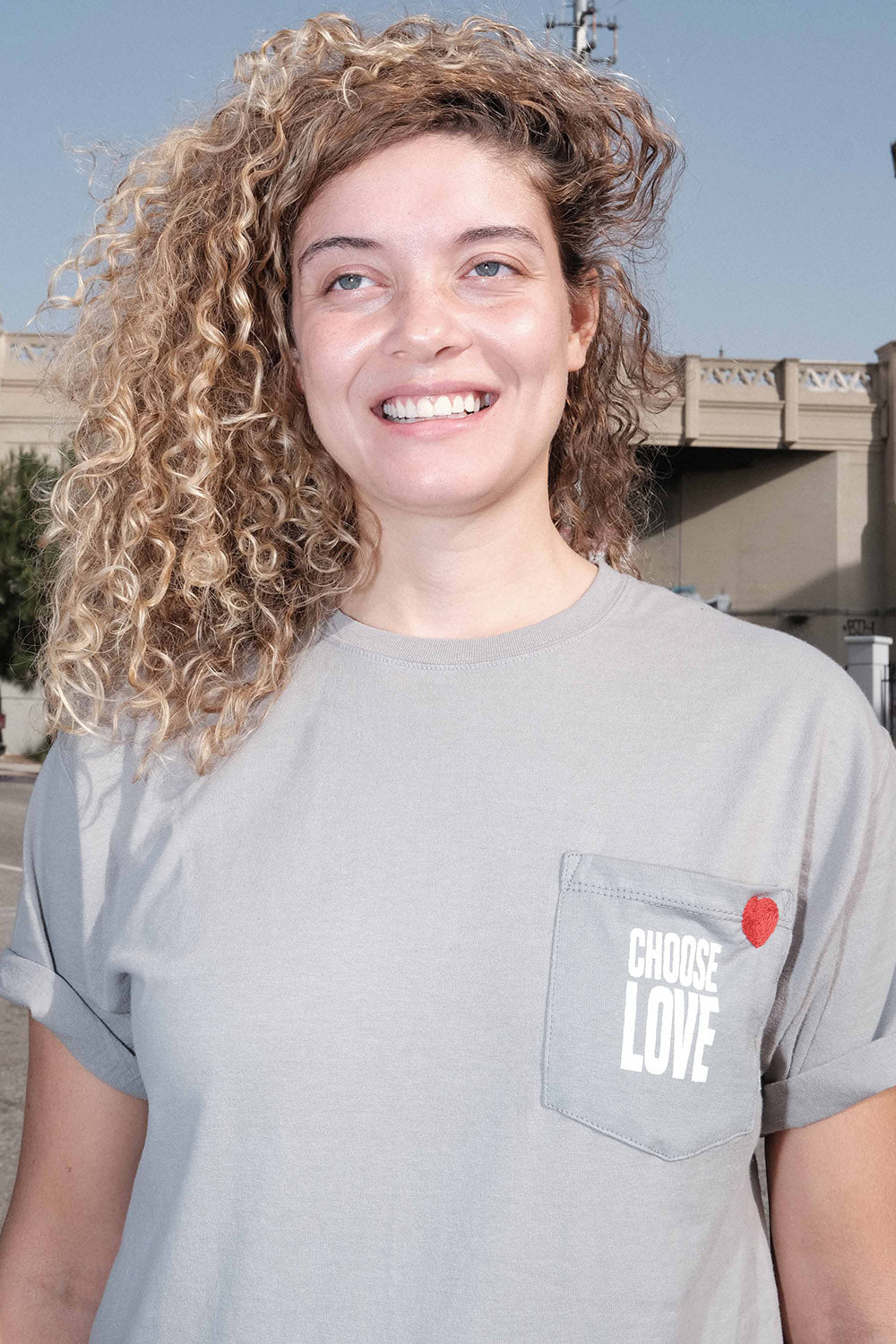 Model wearing Choose Love + Neococo hand-embroidered t-shirt